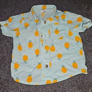 9 month button up pineapple themed short sleeved shirt.